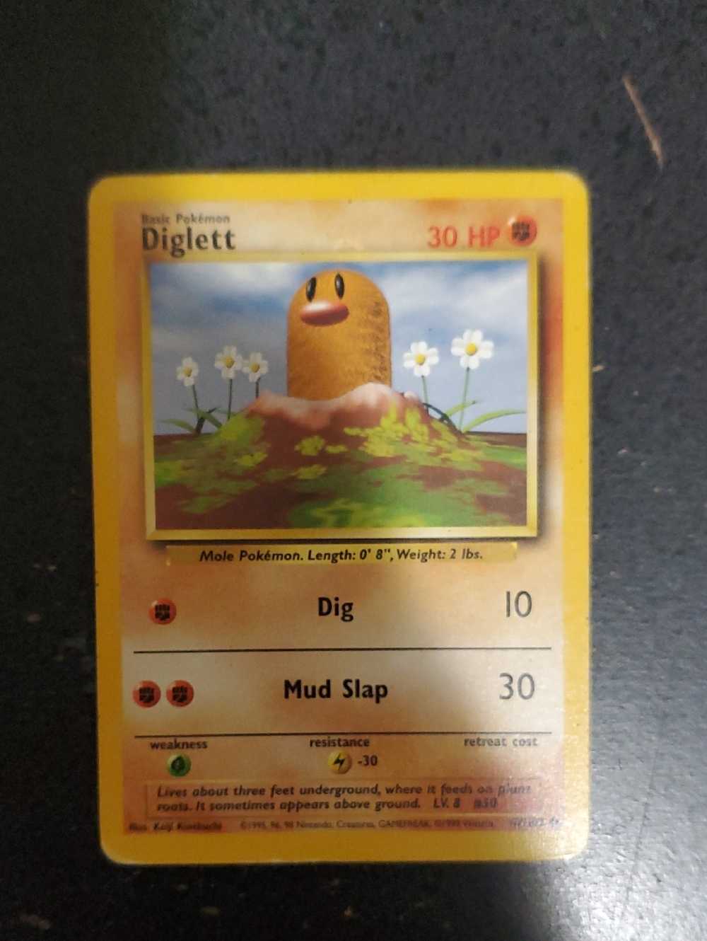 Pokemon Yellow Diglett Card with Brown and Yellow Artwork